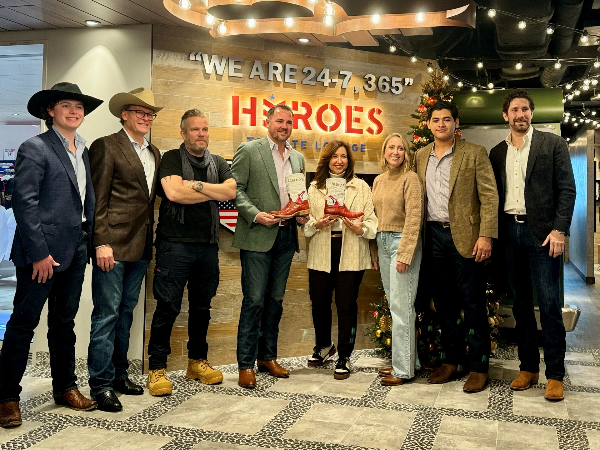 Carnival President Christine Duffy received her pair of handcrafted Carnival Jubilee boots from the bootmakers at Parker Boot Company