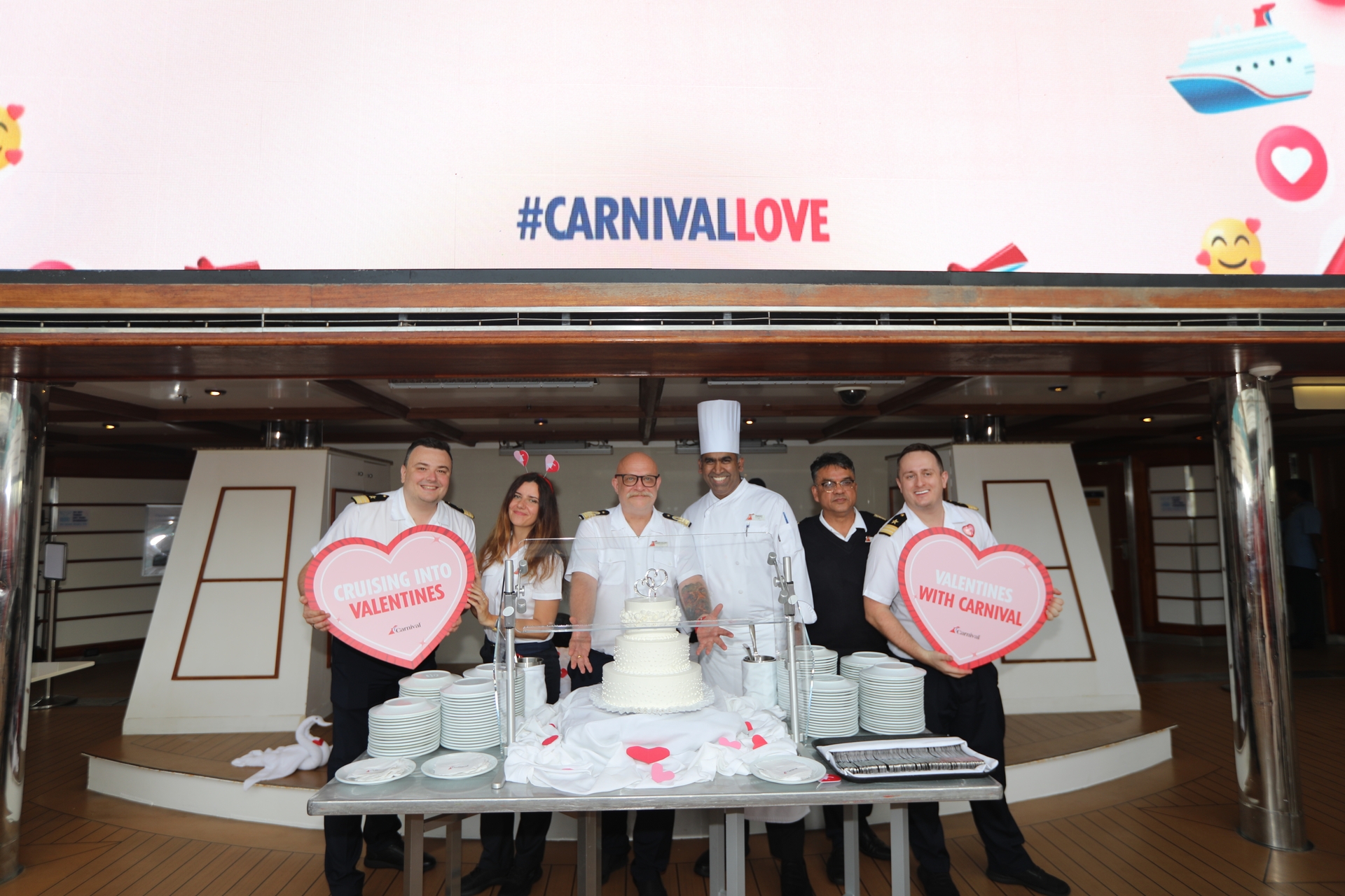 Carnival Cruise Line Crew Presents Cake For Vow Renewal Ceremony